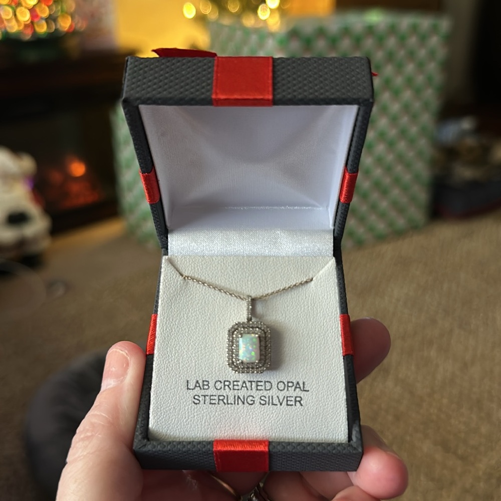 Lab created opal in sterling silver mount with lab created sapphires